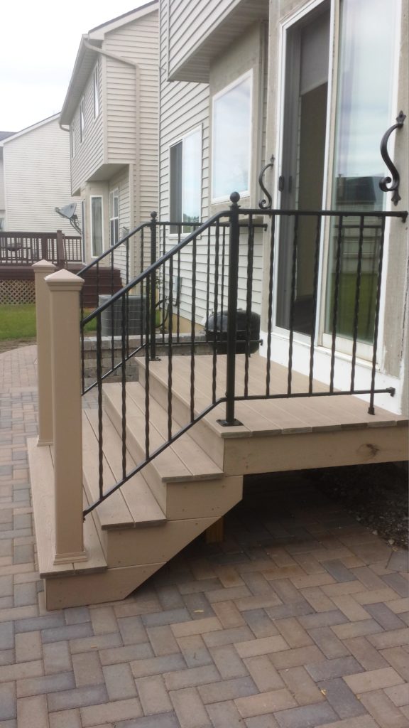 compisite wood stairs with iron rails