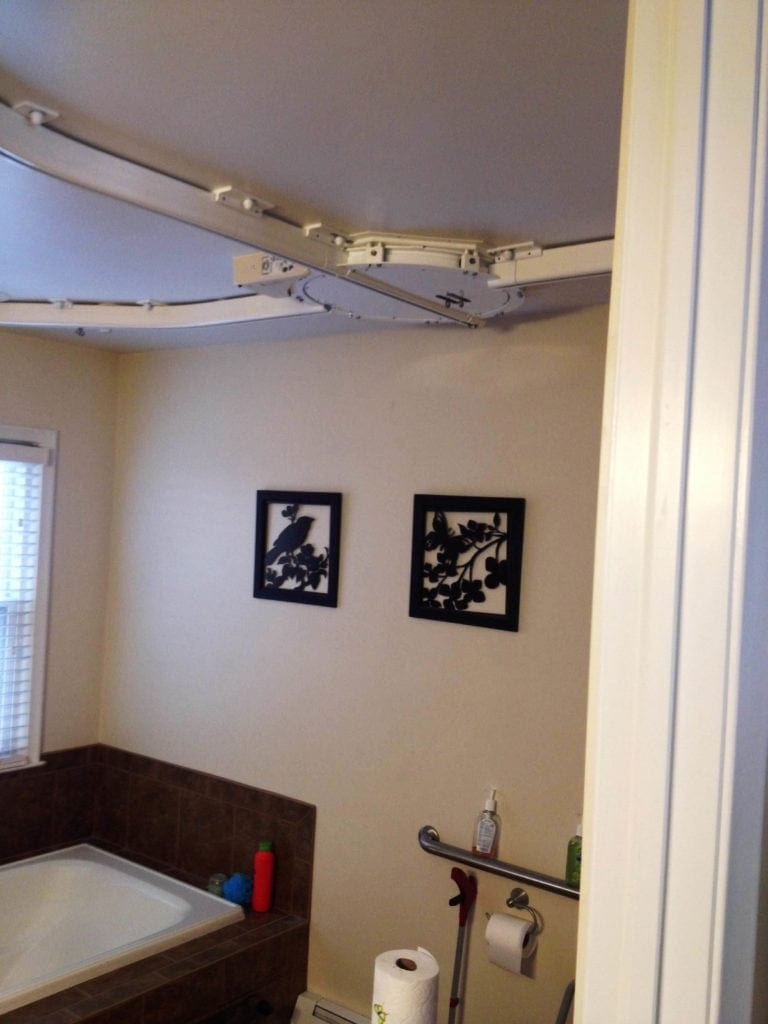 surehands ceiling track lift system bed to bath 2