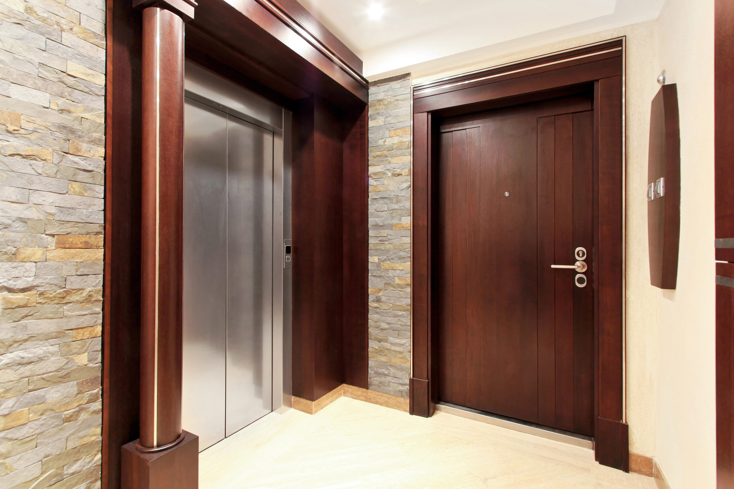 Elevators for House Rentals Michigan: Accessibility, Insurance & ROI 11 Elevator beside the door of the house